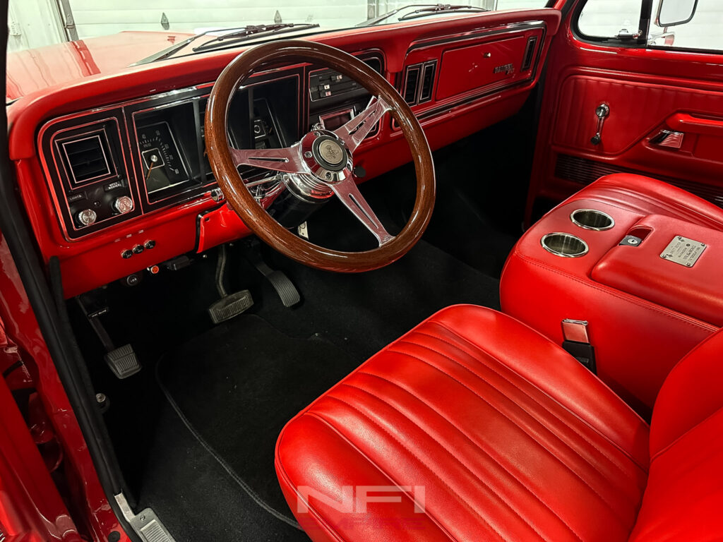 Custom red interior of a 1978 Ford Bronco