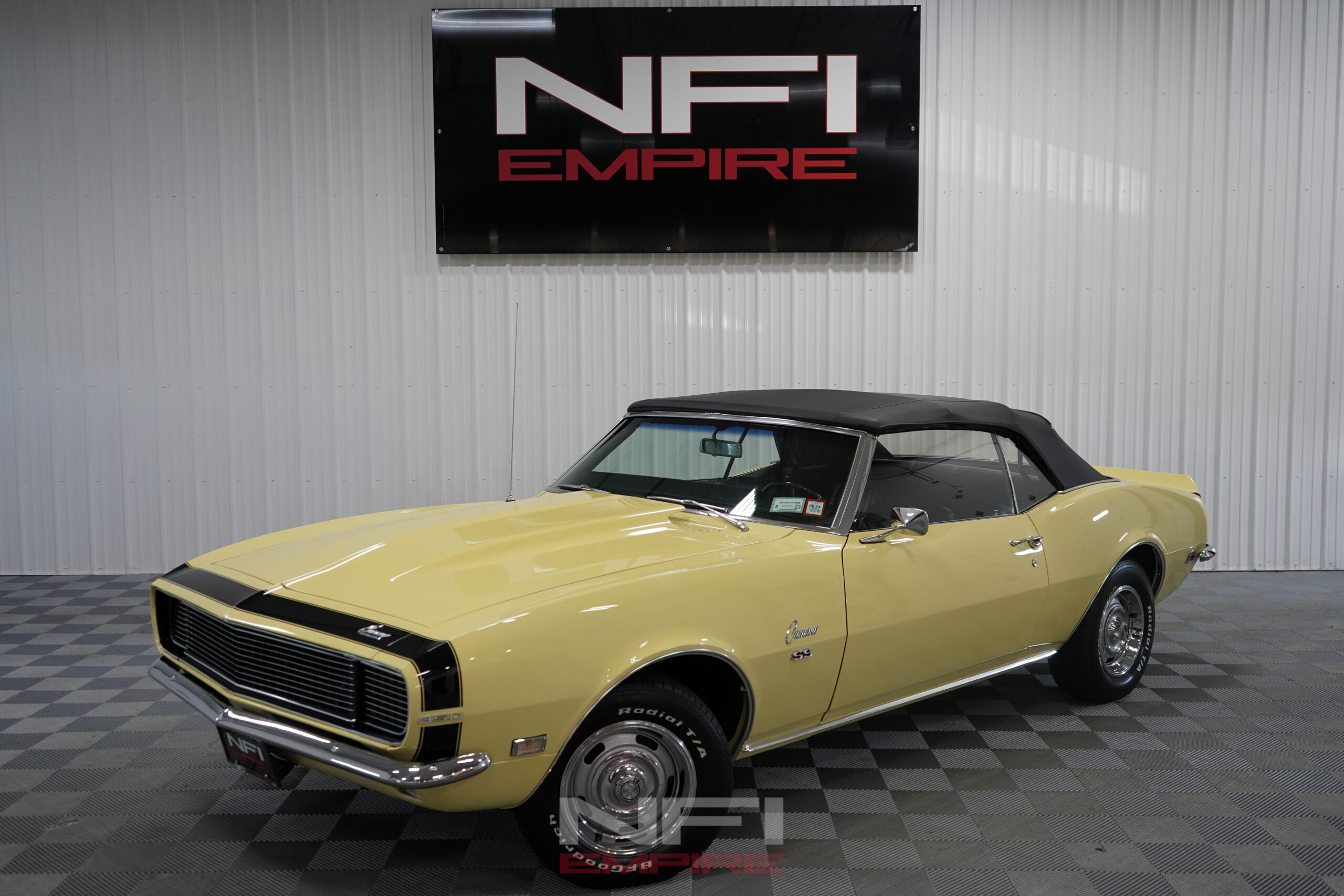 butternut yellow 1968 Chevrolet Camaro SS clone in NFI-Empire showroom